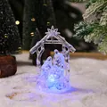 Detail view of crystal nativity scene night light with glowing blue LED illumination - Style 1