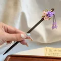 Detail of traditional Chinese hair stick with purple floral tassels and beads - Purple Glory Style (FZ24244)
