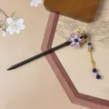 Detailed shot of traditional Chinese tassel hairpin with purple flower and blue beads - Shiguangcai Style (FZ0225)