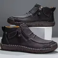 Scarpe alte in pelle nera con cerniere laterali e raffinati dettagli cuciti a mano. - 38 / Nero (828)