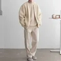 Stylish beige oversized ribbed knit cardigan for men in minimalist fashion style - S / Tops / Apricot