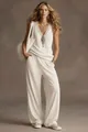 Gesamtansicht des eleganten weißen V-Ausschnitt-Tops und der weiten Hose im Lounge-Set - XS / Oberteil Und Unterteil / Gebrochenes Weiß