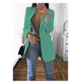 Gedetailleerd overzicht van een modieuze mintgroene slim fit blazer met reverskraag - Groen