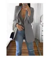 Modieuze grijze slim-fit blazer voor dames gestyled met een casual blauwe spijkerbroek - donkergrijs