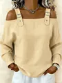 Detail of beige off-the-shoulder long sleeve top with decorative buckle straps - S / Tops / Yellow