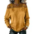 Close-up shot of women's mustard yellow cold shoulder top featuring buckle strap details - Earthy Yellow