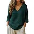 Detail view of a stylish dark green women's loose V-neck top made of soft slub cotton fabric - Dark Green