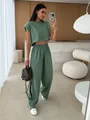 Sage green two-piece set featuring padded shoulder sleeveless crop top and trousers - S / Top And Bottom / Two-Piece Set / Green
