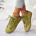 Avocado green suede lace-up casual women's shoes shown on a model with gold anklet - 35 / Green