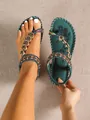 Detailed view of dark green bohemian ethnic flat sandals with beaded straps and floral prints - 38 / Dark Green