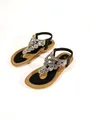 Women's flat T-strap sandals with luxury rhinestone flower embellishments in black and tan. - 36 / Black