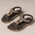 Bohemian braune flache Sandalen mit handgefertigten Perlen und Strass-Schmetterling - 35 / Kaffeebraun