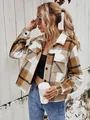 Detailed view of women's cropped plaid jacket with lapel and button closure. - Apricot Plaid / L