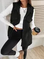 Vista dettagliata del gilet in pile nero da donna con revers e bottoni coordinati - Taglia S / Top / Nero
