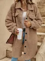 Close-up of a cozy long sherpa coat in camel with button details for winter - S / Tops / Khaki