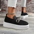 Close-up of black fly-knit platform loafers with decorative chunky gold chain - 36 / Black