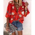 Close-up of vibrant red floral blouse with loose sleeves and button details - S / Tops / Red