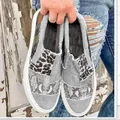 Detail showing women's patchwork canvas loafers with stylish leopard and snakeskin prints. - 36 / Gray