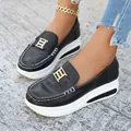 Close-up of stylish black platform loafers with white stitching and gold buckle detail - 36 / Black