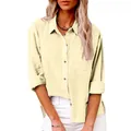 Close-up detail of light yellow cotton linen shirt texture with chest pocket and buttons - 3XL / Tops / Beige