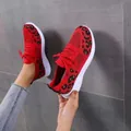 Stylish red leopard print mesh sneakers with comfortable white flat sole and red laces - Red