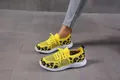 Yellow leopard print mesh sneakers with white wavy sole and lace-up design - Yellow