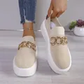 Elegant beige knit slip-on loafers for women featuring decorative gold chain and platform sole - Off White