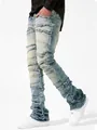Close-up of men's stacked denim jeans with patchwork frayed details in light blue wash. - S / Bottoms / Nostalgia Blue