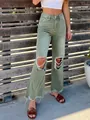 Close-up of women's high-waisted olive green ripped jeans with distressed details. - S / Bottoms / Green
