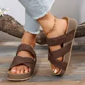 Detailed close-up of brown platform cross strap sandals featuring braided strap texture - 35 / Dark Brown