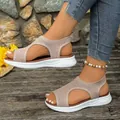 Close-up of beige fly-knit peep toe sandals on model for a stylish summer look - 36 / Khaki