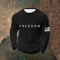 Close-up detail of a men's black waffle knit sweatshirt with Freedom chest print. - S / Tops / Black