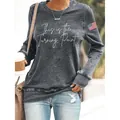 Close-up of women's charcoal round neck long sleeve sweatshirt with script print - S / Tops / Dark Gray