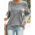 Close-up of women's grey long-sleeve sweatshirt with Turning Point text and US flag - S / Tops / Light Gray