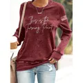 Detail of burgundy long sleeve sweatshirt with 'This is the Turning Point' print - S / Tops / Burgundy