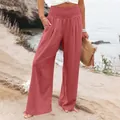 Pantaloni larghi in lino rosso terracotta da donna con vita elasticizzata in spiaggia. - Taglia S / Pantaloni e gonne / Rosso corallo