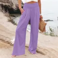 Dettaglio dei pantaloni larghi in lino viola con vita alta elasticizzata e tasche - Taglia S / Pantaloni e gonne / Viola
