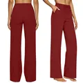 Detail view of high-waisted burgundy wide-leg pants with drawstring and pockets. - Burgundy