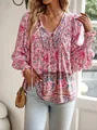 Detailed view of bohemian pink floral blouse with lace-up V-neckline and elastic cuffs. - 3XL / Tops / Pink