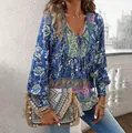 Detailed view of bohemian holiday style floral print blouse featuring a V-neck tie - 3XL / Tops / Navy Blue