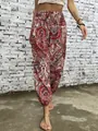 Detailed view of ethnic pattern print on bohemian harem trousers with elastic waist. - Pattern 6