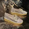 Detailed view of women's glitter rhinestone loafers with 4cm platform heel height annotation - 35 / Gold