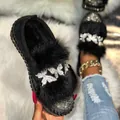 Mocassins d'hiver noirs avec fausse fourrure et décorations papillon en strass brillants - 36 / Noir