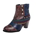 Macro view of women's ethnic patchwork ankle boots featuring embossed floral patterns - 35 / Dark Brown