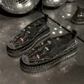 Close-up of stylish black loafers with sparkling rhinestones and thick platform soles - 35 / Black