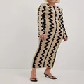 Elegant slim-fit knitted maxi dress featuring unique black wavy pattern on tan fabric - S / Dresses / Brown Rippled