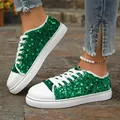 Detailed view of women's green sequined flat sneakers with white laces and soles - 36 / Green