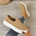 Detail showing the texture of tan suede slip-on shoes with thick white platform soles - 36 / Apricot
