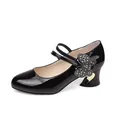 Elegant black patent leather Mary Jane pumps featuring a rhinestone butterfly and chunky heel. - 35 / Black