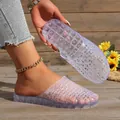 Detailed close-up of purple glitter hollow jelly clogs with thick non-slip platform soles - 36 / White